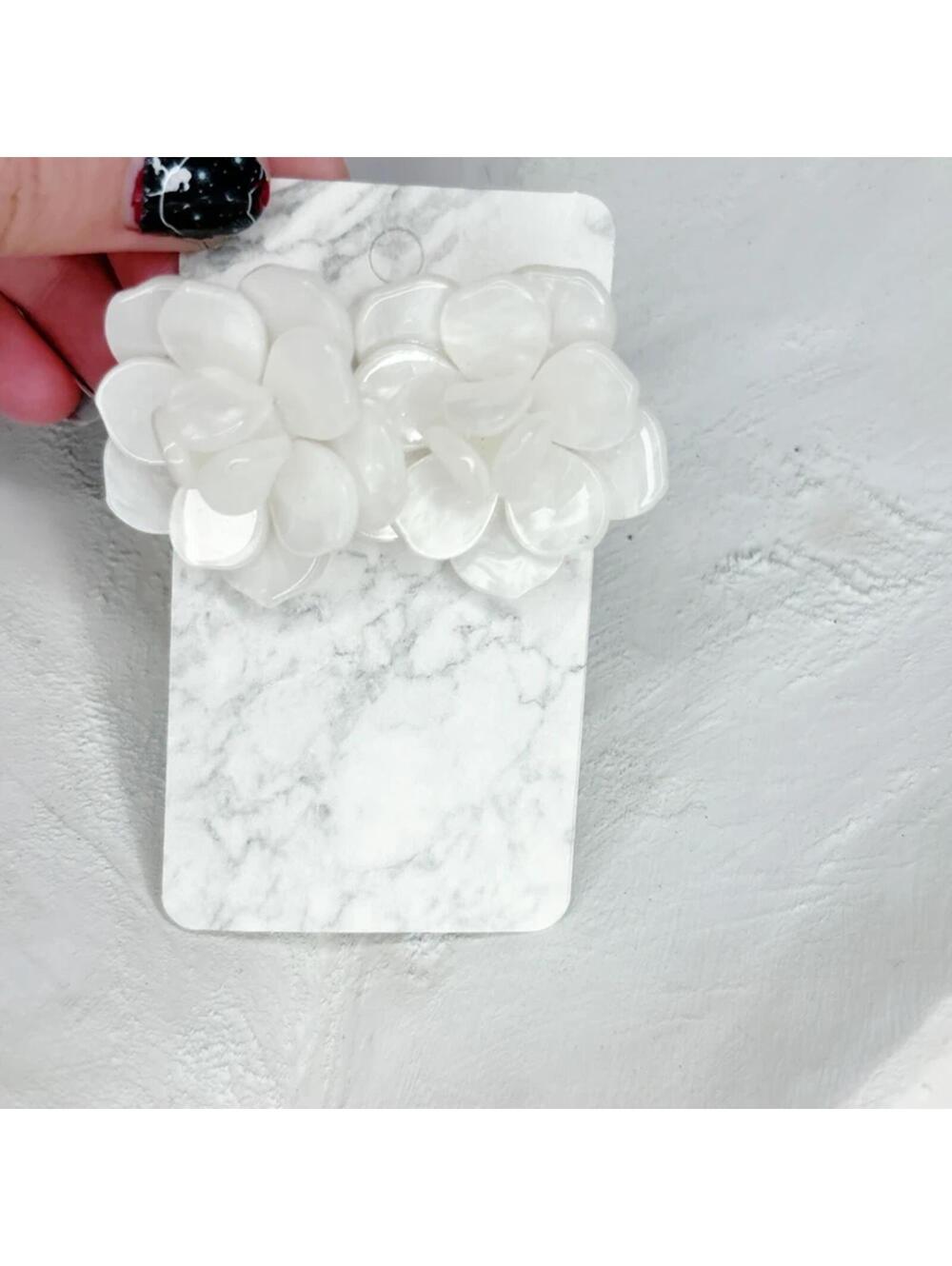 406u. Ivory Marbled Plastic Earrings